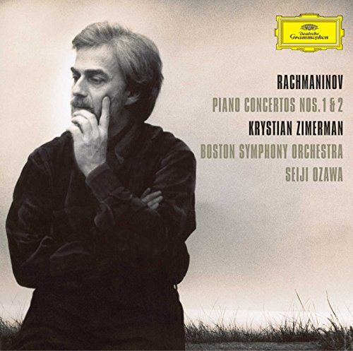 CD cover featuring a man in contemplative pose with text and a yellow logo.