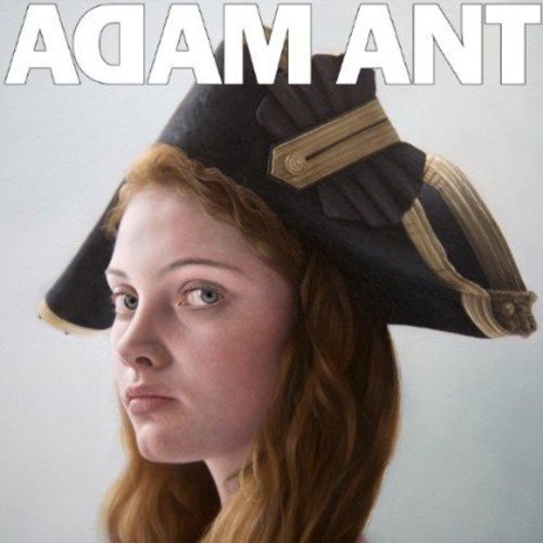 Red-haired woman wearing a black and gold tricorn hat, against a plain background.