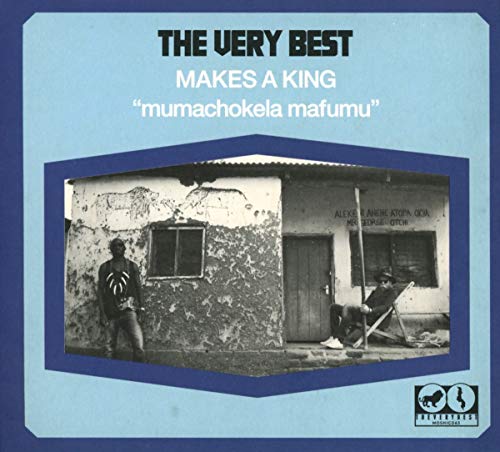 CD cover with two men in front of a simple building.