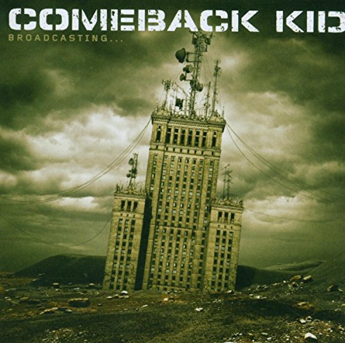 "Album cover featuring a tall, ruined building with antennas and cloudy sky."