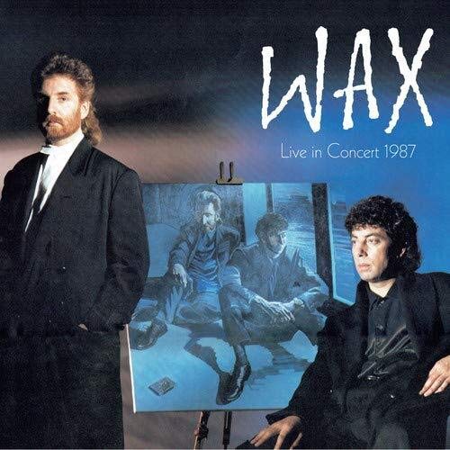 "Album cover featuring two men and a painting on an easel."