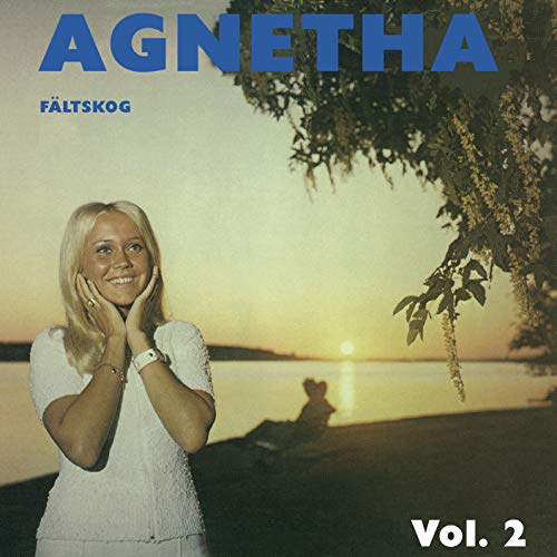 The image is a CD cover for Agnetha Fältskog's album. The alt text for this image could be: "Album cover featuring a blonde woman in a white dress, standing by a serene lake at sunset."
