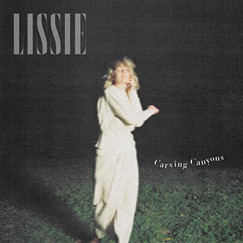 Album cover for Lissie’s “Carving Canyons” featuring a woman in a coat.