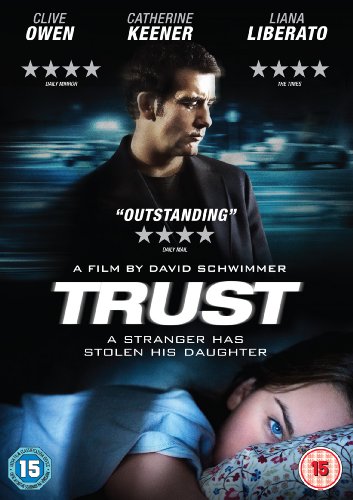 DVD cover for "Trust" featuring a man and a girl, with a dark background.