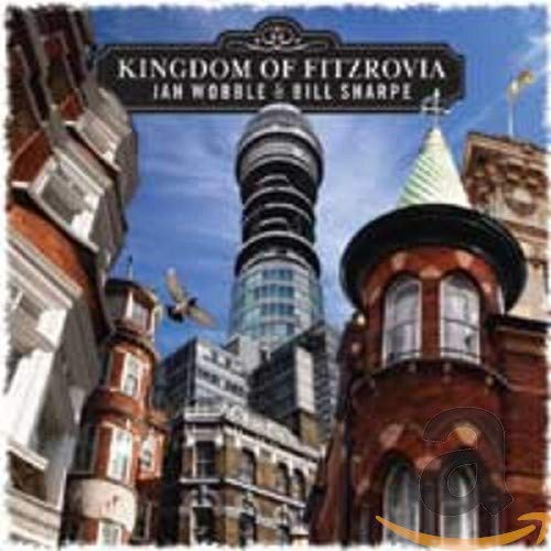 CD cover: surreal cityscape with towers, flags, and a bird.