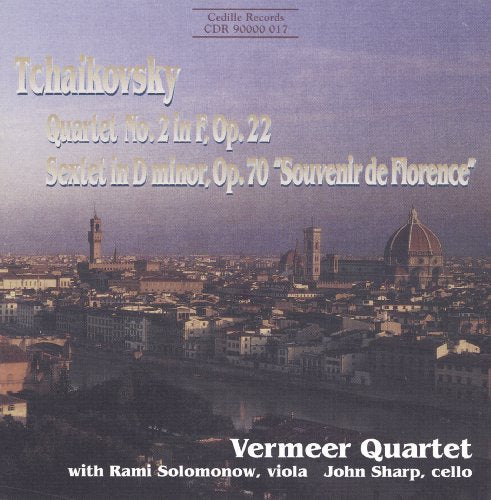 "CD cover with a cityscape image and Tchaikovsky's composition details."