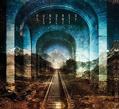 CD cover with a railway track receding into a mountain landscape.