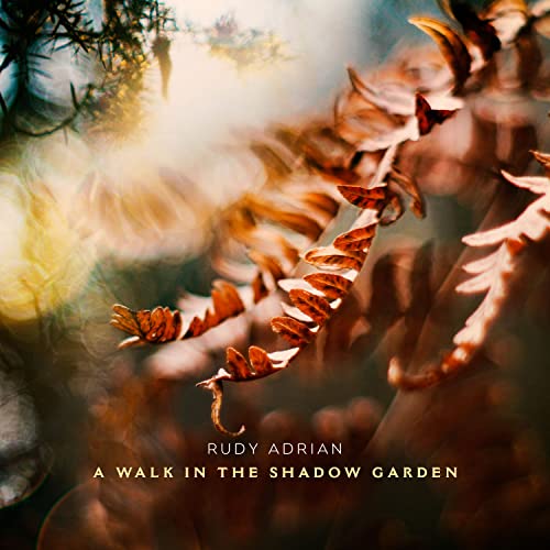 CD cover: close-up of autumn leaves with blurred garden background.