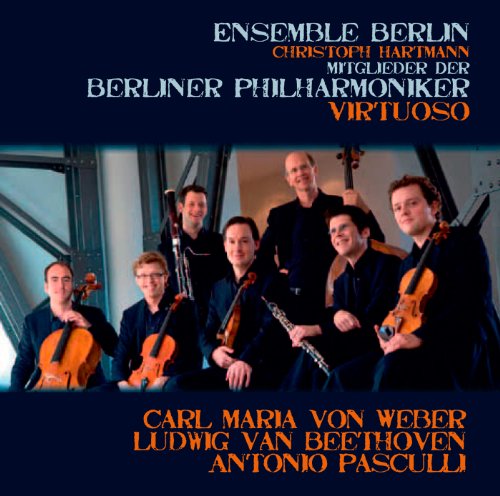"CD cover with seven musicians holding instruments, against a dark blue background."