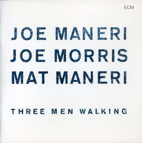 "Album cover with blue text on white background, featuring artist names and title."
