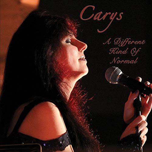 "Album cover featuring a woman singing into a microphone with red lighting."