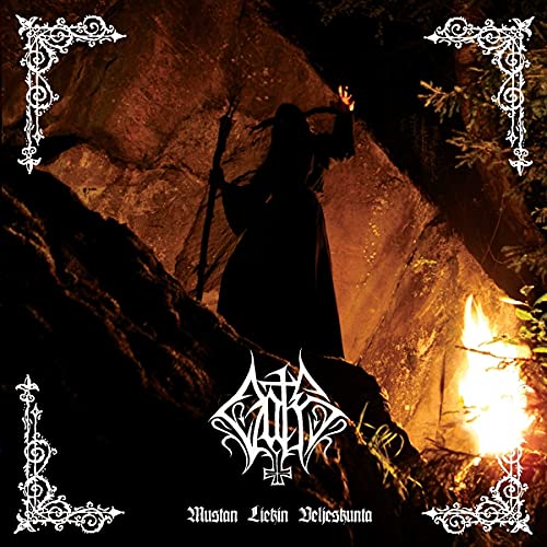 CD cover: Silhouette of a cloaked figure before a rocky cave and fire.