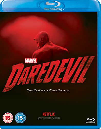"Blu-ray cover featuring Daredevil, a bald man, in red lighting against a black background."