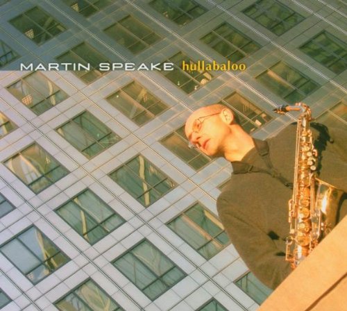 "Album cover with a man holding a saxophone in front of a building."