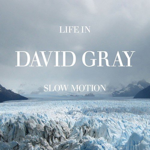 "David Gray's 'Life In Slow Motion' CD cover featuring a glacier landscape."
