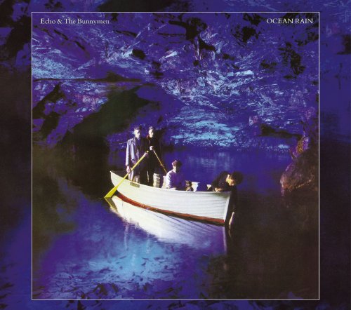 "Album cover art: 'Ocean Rain' by Echo & The Bunnymen, featuring a boat in a cave."
