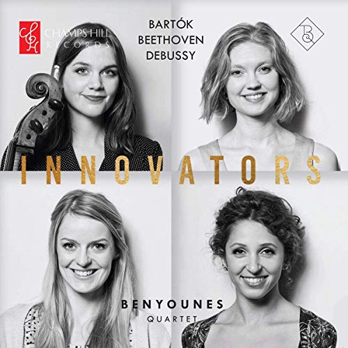 "CD cover with four black-and-white portraits of women and gold text."