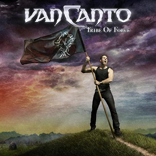 Album cover: man holding a flag on a grassy hill.