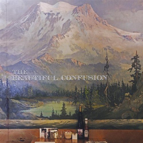 CD cover: painted mountain landscape with text and foreground objects.