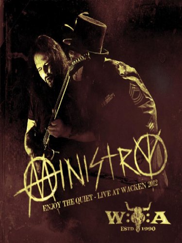 "Music DVD cover featuring a man playing guitar, wearing a top hat, against a dark background."