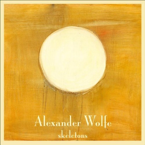 The image shows a CD cover with a yellow background and white circle.