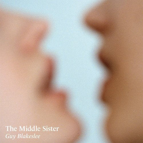 Blurred image of two faces in profile with album title text.