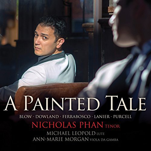 Album cover with a man sitting on a brown chair, looking over his shoulder.