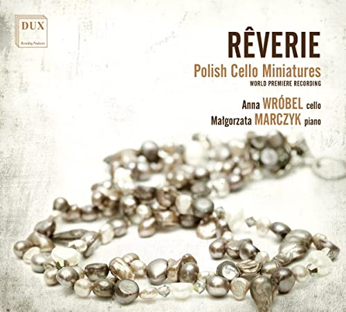 CD cover for "Reverie" featuring a tangled string of pearls.