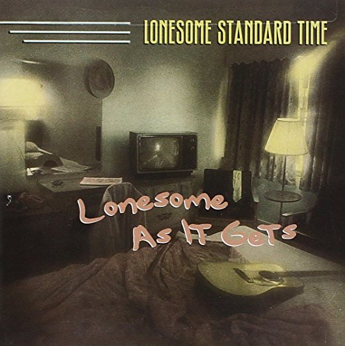 "Lonesome Standard Time - Lonesome As It Gets" CD cover featuring a dimly lit motel room scene.