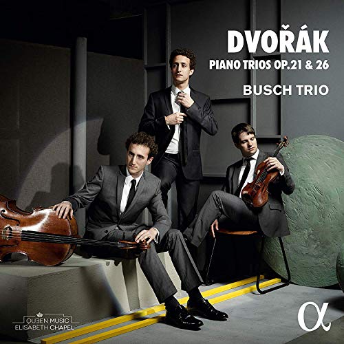 CD cover featuring three suited men with violins in a modern setting.