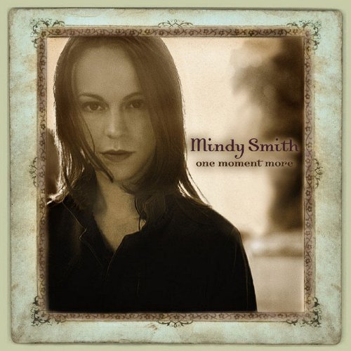 "CD cover featuring sepia-toned portrait of Mindy Smith with ornate border."