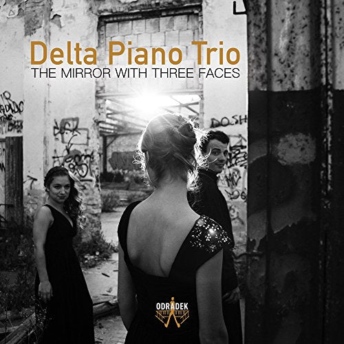 "Album cover with three people in black and white, orange and white text."
