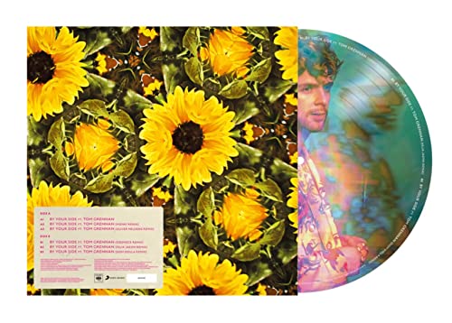 Vinyl record with sunflower cover art and portrait of Tom Grennan.