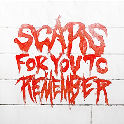 Red, drippy text reading "Scars For You To Remember" on a white tiled wall.