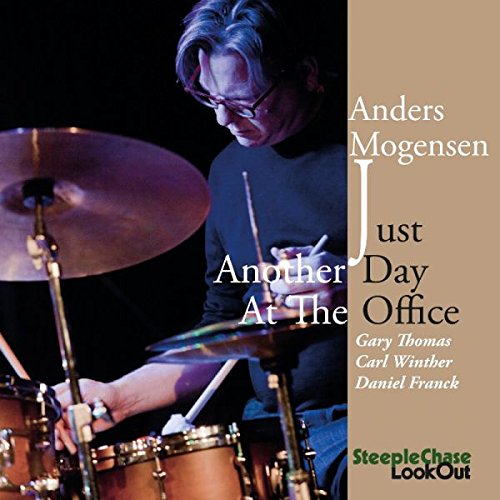 "CD cover featuring a man playing drums with text overlay."