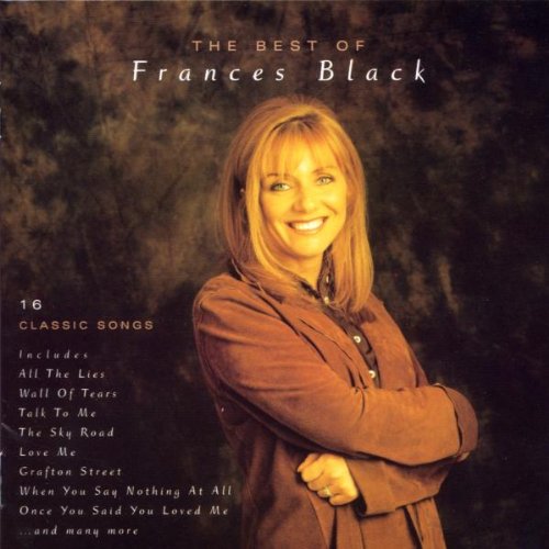 "CD cover with a smiling woman in a brown jacket against a dark background."