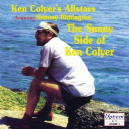 Album cover with man crouching by water, wearing white shirt and hat.