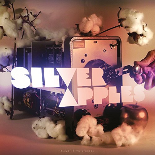 Silver Apples album cover with apples, a radio, cotton, and a hand.