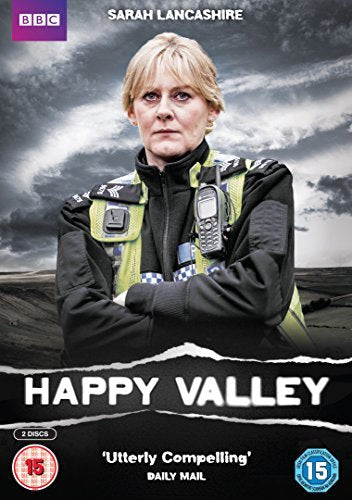 DVD cover featuring a woman in a police uniform with a cloudy background.