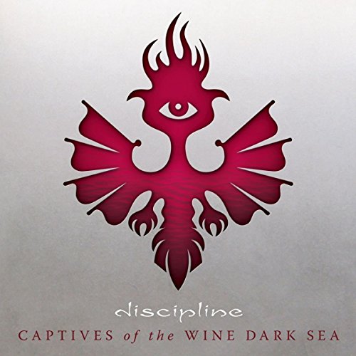 CD cover: red phoenix-like symbol with an eye, text "Discipline".