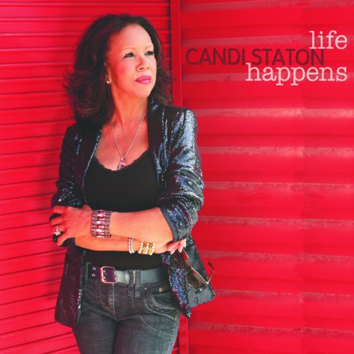 "Album cover featuring a woman in a shiny jacket against a red wall."