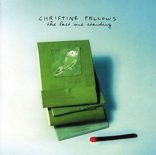 "Album cover with green book and bird image, matchstick nearby, on blue-white background."