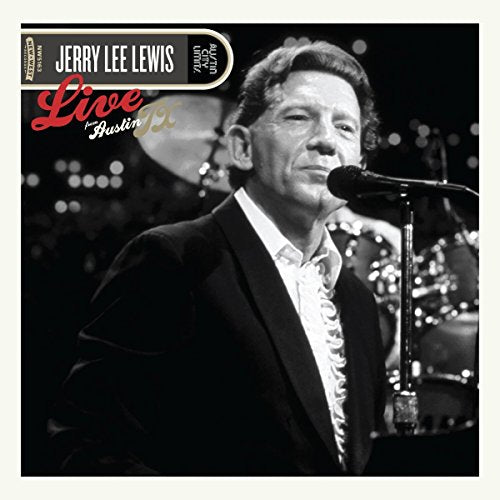 Black and white vinyl album cover featuring Jerry Lee Lewis singing into a microphone.