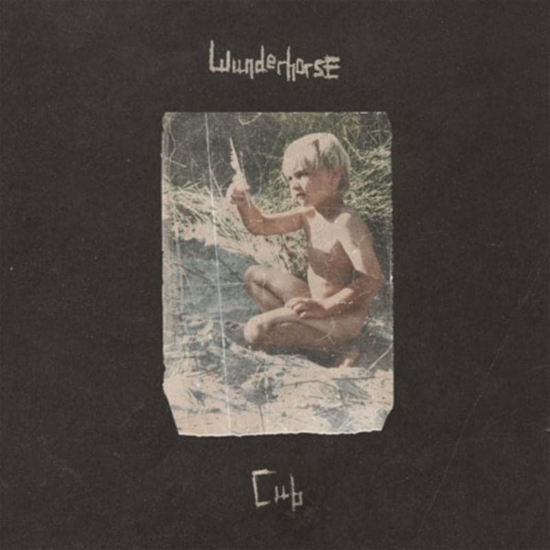 CD cover for Wunderhorse’s “Cub” featuring a young boy in nature.