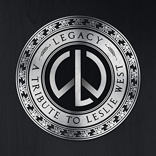 Silver circular album cover with "Legacy" and peace symbol design.