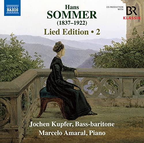 CD cover: woman in black dress seated on stone bench overlooking landscape.
