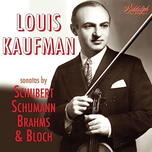 Portrait of violinist Louis Kaufman holding a violin and bow.
