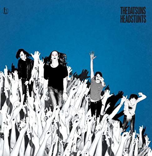 Album cover for The Datsuns’ “Headstunts” featuring band members in a crowd.