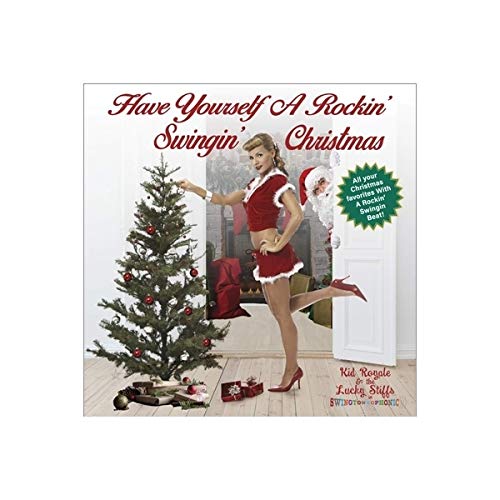 CD cover: woman in red outfit near Christmas tree and Santa.