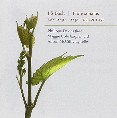 CD cover with green plant and red and blue text on white background.